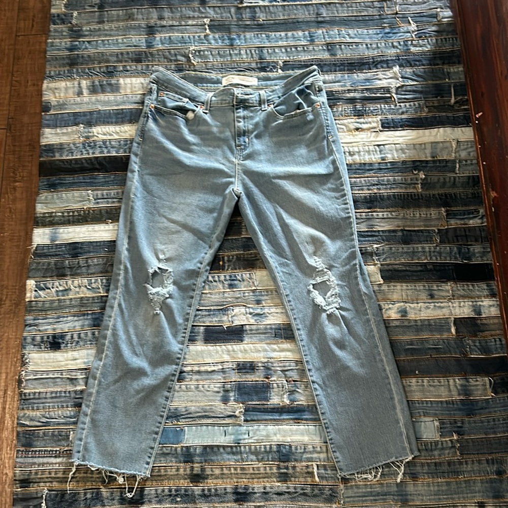 Levi Strauss mid-rise boyfriend jeans with rip and fraying detail
